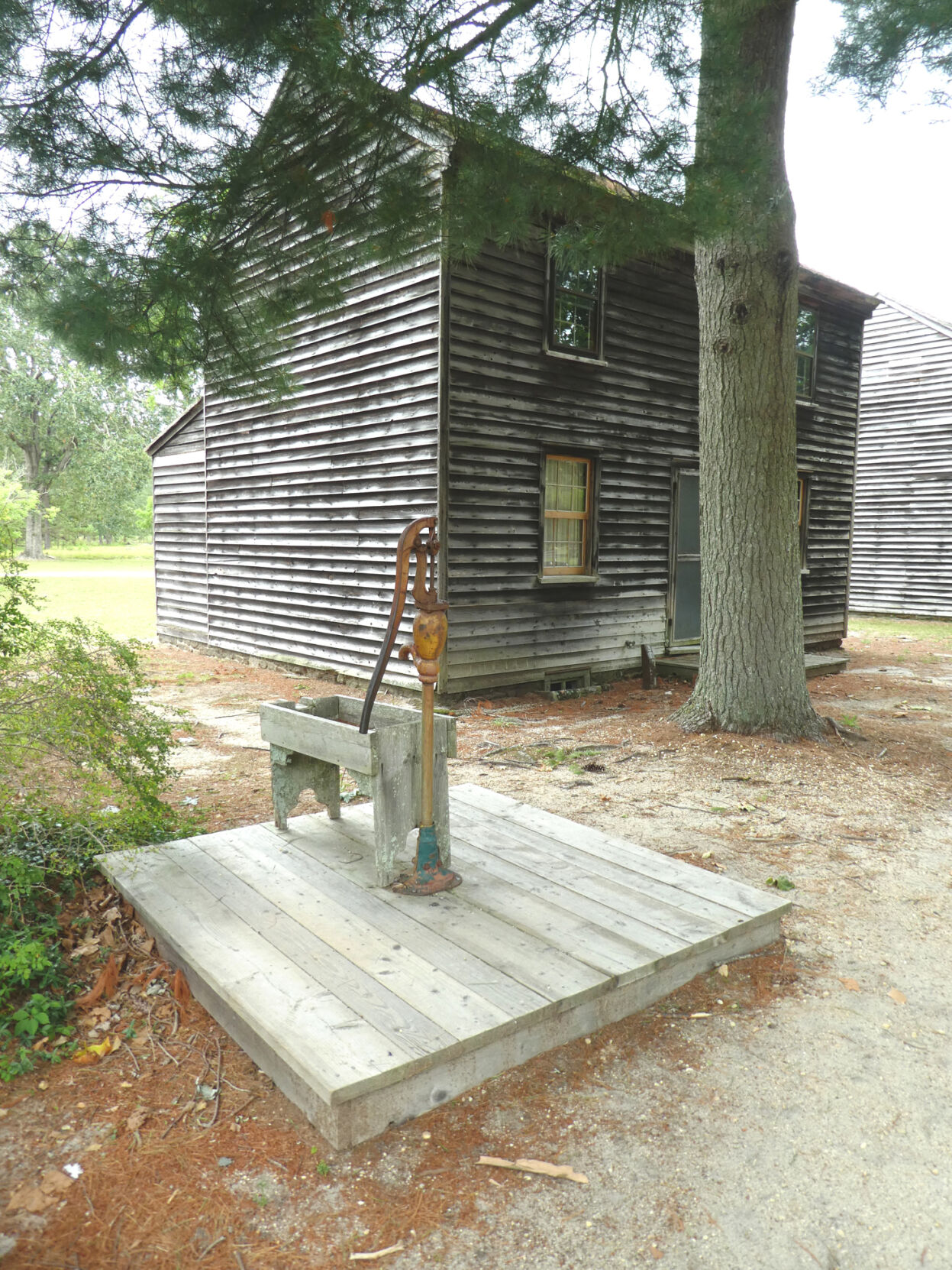A Village House and Water Pump.JPG